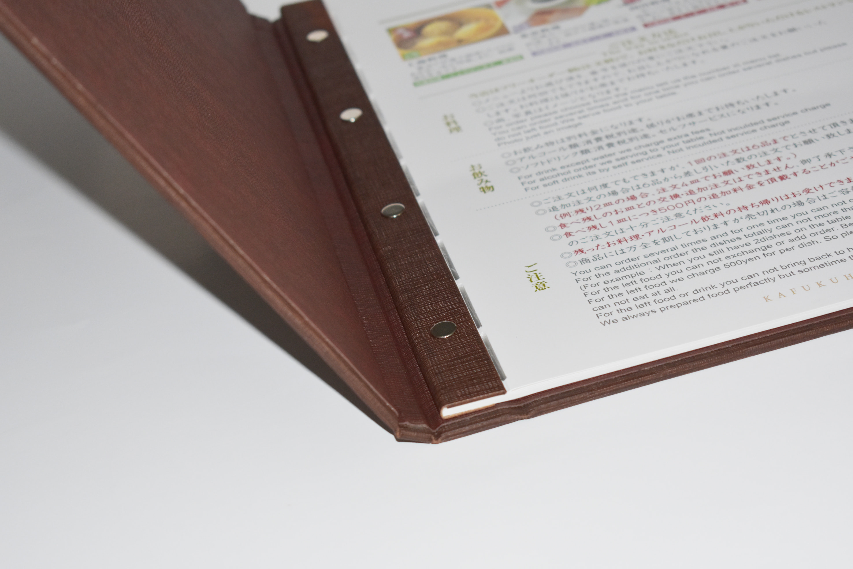 硬壳压条内钉装-幸福饭店-内页模切-封面烫黄金